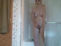 Hot mature wife takes a hot shower