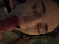 Little diligently doing blowjob and gets load on face
