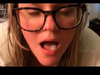 Blonde with glasses sucks cock and gets cum in her mouth