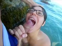 Blowjob from a cute brunette in the water