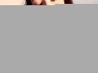 She rode me wildly, moaning as I stretched her tight hole.