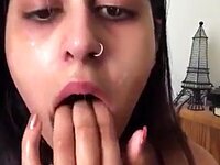 I suck deeply on my fingers, fantasizing about your large penis.