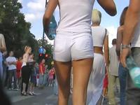 Pretty slim bimbo in the tight white pants proudly demonstrating the hot perfect body