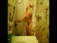 Hot girl taking a shower