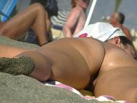 Hot oiled girl on the beach
