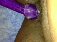 Girl creams all over her purple dildo