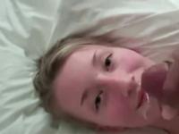 Cute blonde makes her man cum on her face